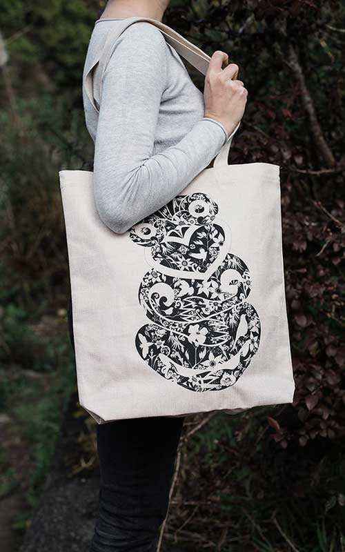 Aroha Tiki Hemp Tote Bag by Bec Robertson Model