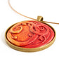 Ceramic Curled Red Koru Pendant by Craig Fletcher Side